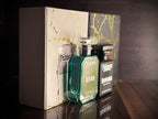 Faizaura Fragrance Rawaan & Divine perfume bundles in 50ml bottles, featuring elegant glass bottles with decorative caps.
